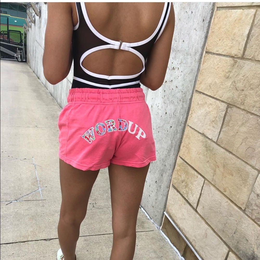 Pink Word Up small shorts.